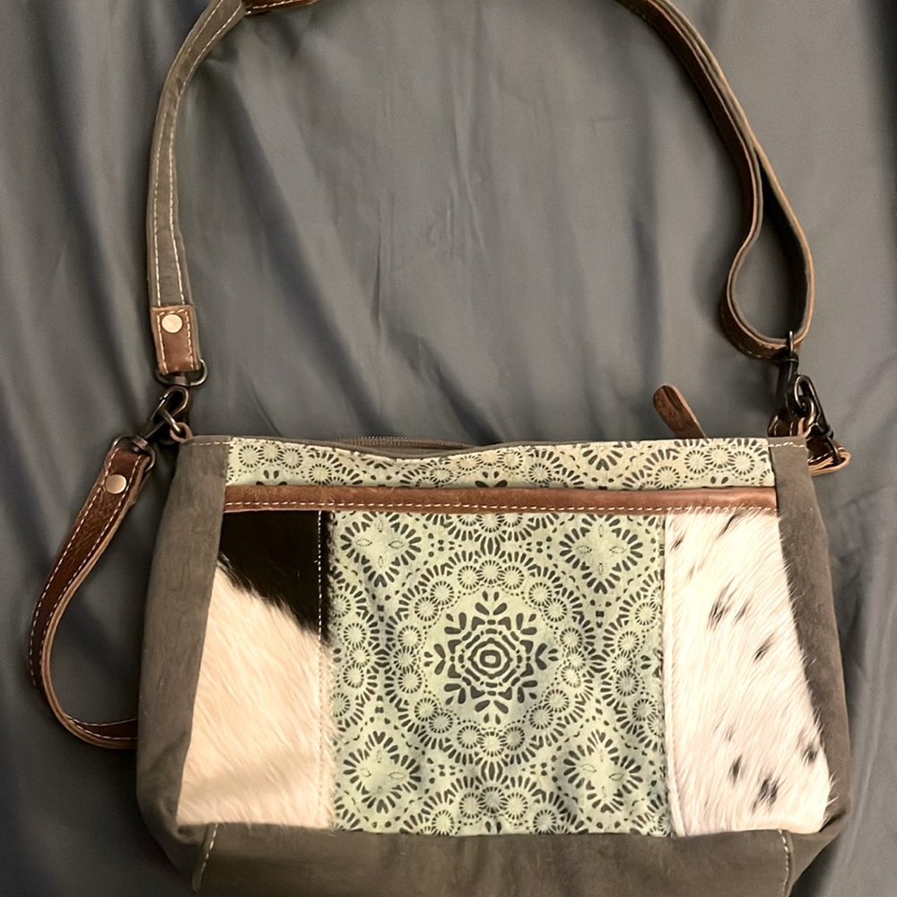 Myra Bag/crossbody. Two straps. Great condition. All zippers working.